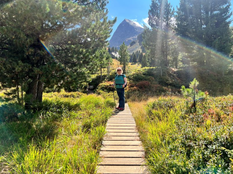 Natalie walking in the mountains